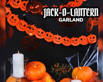 May include: A hanging garland featuring orange paper jack-o-lantern cutouts with carved facial expressions. The text JACK-O-LANTERN GARLAND is printed in white. Below are several orange pumpkins and white pillar candles in glass holders.