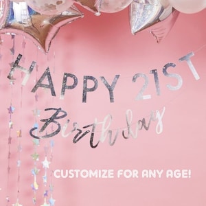 May include: Silver glitter Happy 21st Birthday banner with a pink background. The banner is strung with silver stars. The text "Customize for any age!" is printed below the banner.