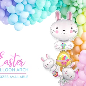 May include: Easter balloon arch kit with five sizes available. The arch features pastel coloured balloons and three white bunny balloons. The largest bunny balloon is holding an Easter egg and the two smaller bunnies are holding Easter eggs in baskets.