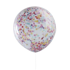 May include: A clear balloon filled with colorful confetti. The confetti is in shades of pink, red, yellow, blue, and purple.
