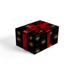 May include: A black gift box with a red ribbon and a repeating pattern of green marijuana leaves and the text "MisterGreen" in pink.