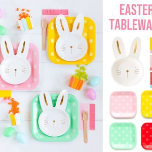 Puede incluir: Juego de vajilla de Pascua con platos y cuencos con forma de conejo en amarillo, rosa, verde y rojo con lunares blancos. El juego también incluye servilletas con flecos en amarillo, rosa y rojo.