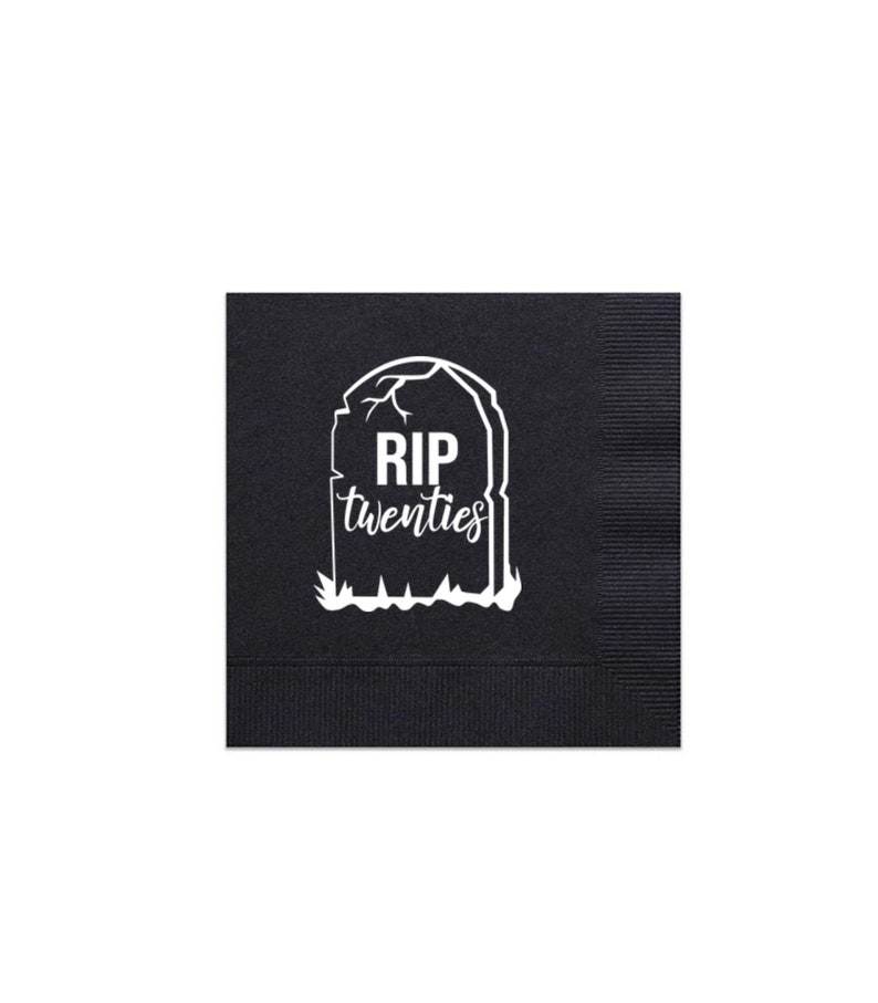 May include: Black beverage napkin with a white tombstone graphic. The tombstone reads "RIP twenties" in a stylized font. The napkin is square and has a textured surface.