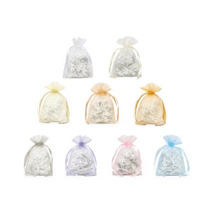 May include: Assortment of ten small, sheer organza bags in various pastel colors, each filled with white tissue paper. The bags have a drawstring closure and are perfect for gift wrapping or packaging small items.