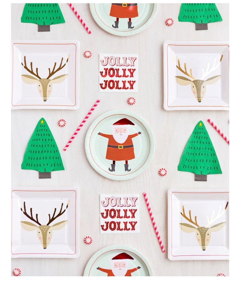 May include: A festive arrangement of Christmas-themed party supplies. Includes square plates with reindeer and Santa Claus designs, green tree cutouts, red and white striped straws, and the text "JOLLY JOLLY JOLLY". Peppermint candies are scattered throughout.