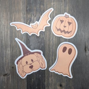 Peach Halloween sticker pack of 4: peachy bat, jack-o’-lantern, witch dog, and ghost