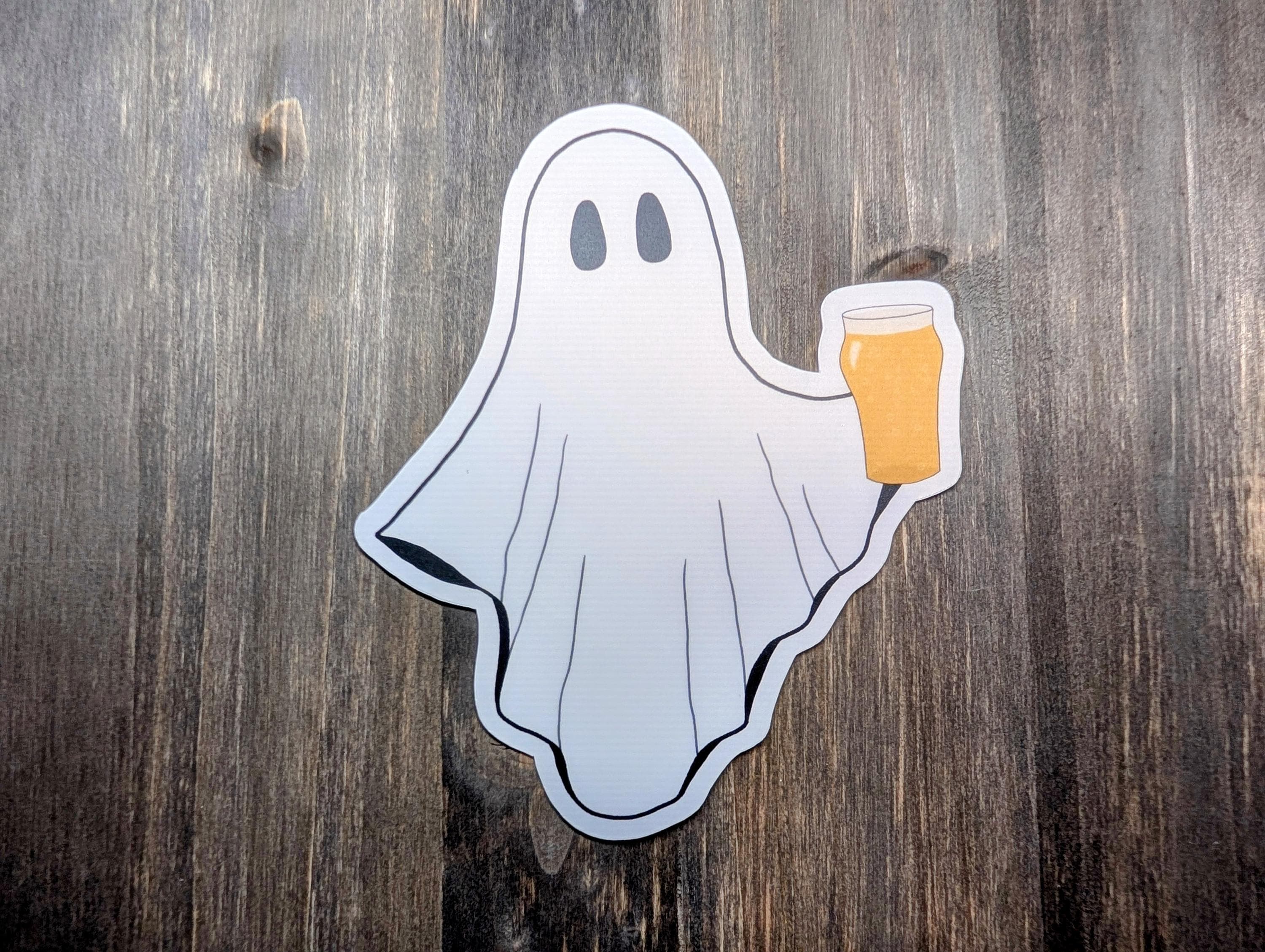 Ghost holding beer pint glass Halloween sticker