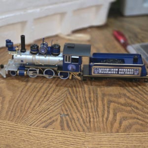 Midnight express model train (missing motor)  and one car