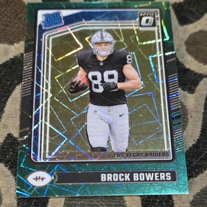 Brock bowers optic  green hyper rated rookie card