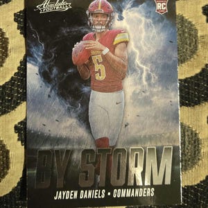Jayden daniels absolute by storm  card