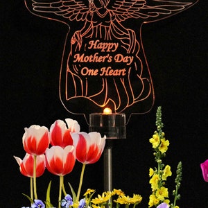 Personalized Acrylic angel solar light grave marker. Made with 3/8 inch laser engraved acrylic and color changing LED Light