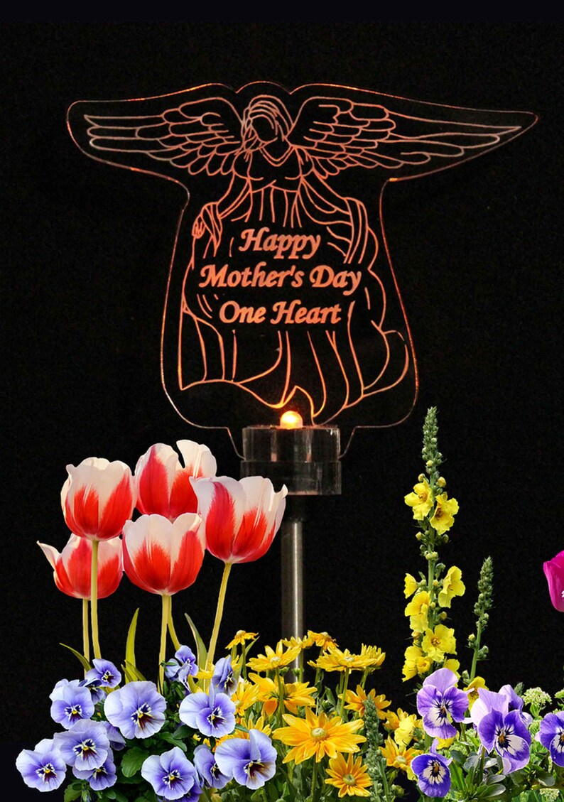 Personalized Acrylic angel solar light grave marker. Made with 3/8 inch laser engraved acrylic and color changing LED Light