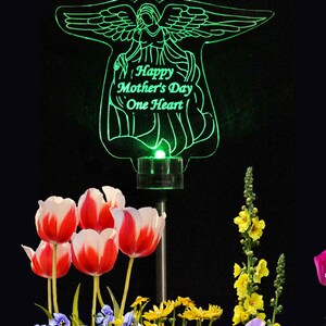 Personalized Acrylic angel solar light grave marker. Made with 3/8 inch laser engraved acrylic and color changing LED Light