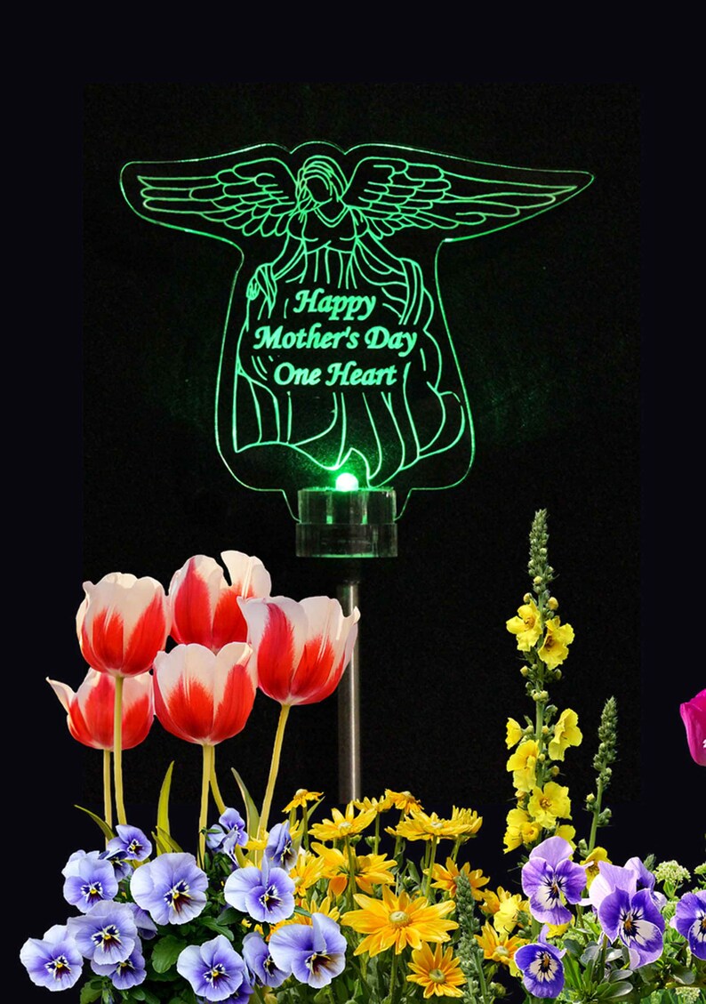 Personalized Acrylic angel solar light grave marker. Made with 3/8 inch laser engraved acrylic and color changing LED Light