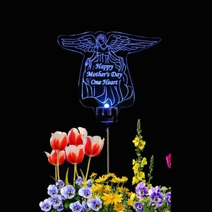 Personalized Acrylic angel solar light grave marker. Made with 3/8 inch laser engraved acrylic and color changing LED Light