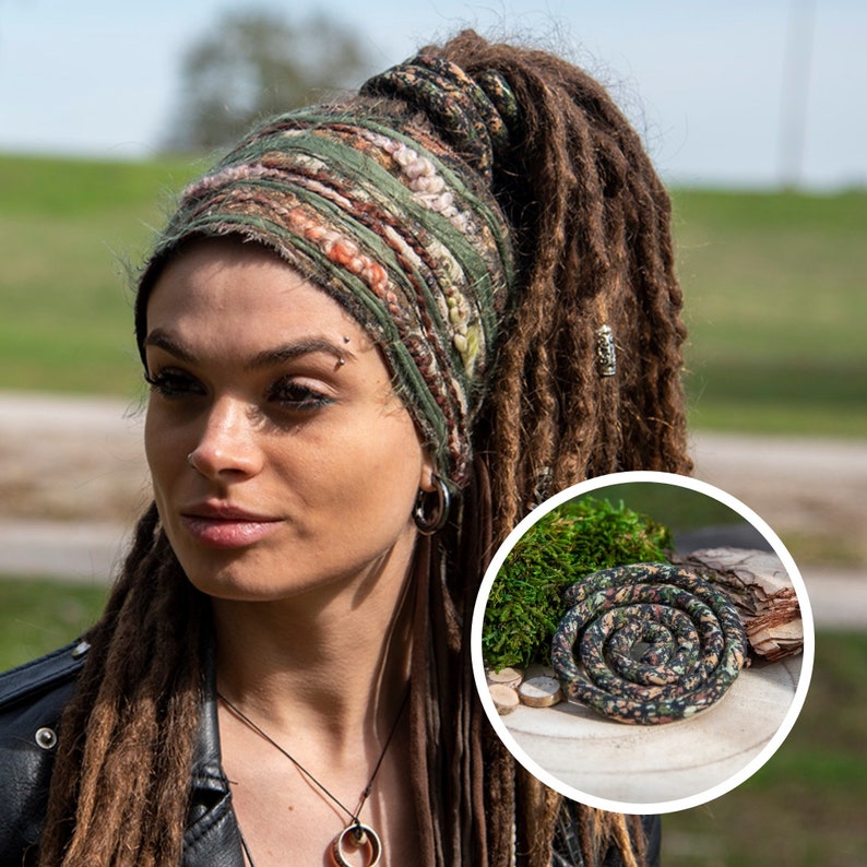 May include: A wide, textured fabric headband featuring a blend of green, brown, and orange yarn fibers. The headband is worn around the head, and an inset circular image displays a coiled, patterned fabric cord resting near green moss and wood.