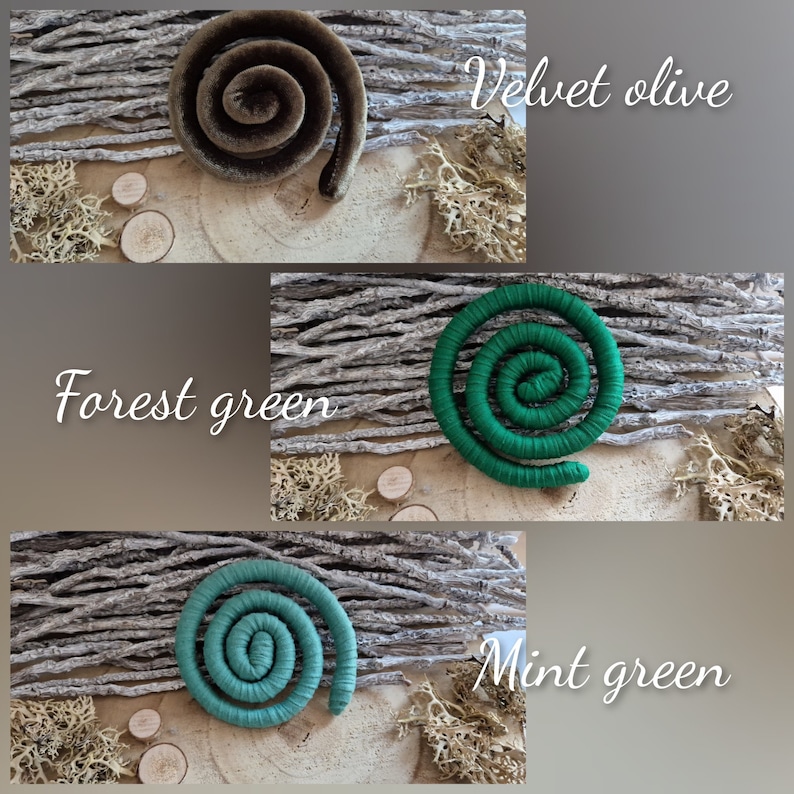 May include: Three spiral-shaped fabric ornaments in olive, forest green, and mint green. Each spiral is displayed against a background of twigs, lichen, and small wooden discs. The text labels read Velvet olive, Forest green, and Mint green.