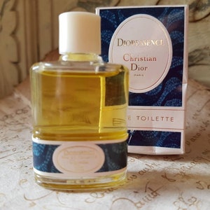 Preciosa miniatura francesa vintage 10 ml 0,5 Ml. Tamaño Christian Dior DIORESSENCE Eau de Toilette Botella coleccionable en caja y embalaje originales