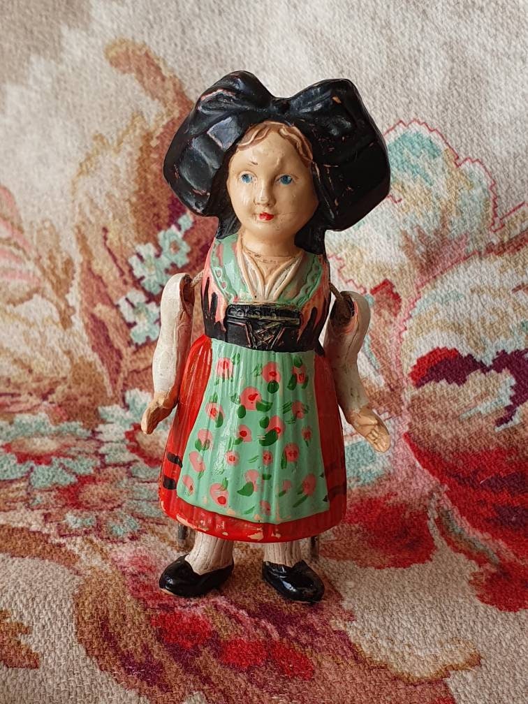 Antique Miniature German Bisque Penny Doll with Articulated Arms – In The  Vintage Kitchen Shop