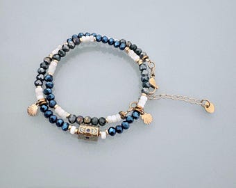 Double bracelet with blue hematite beads and gold-plated sand dollar medallion, women's bracelet with natural stone curb chain and Heishi