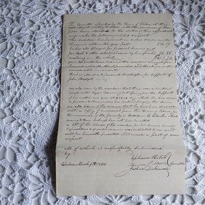 May include: A handwritten document dated March 9, 1870, detailing the financial report of the Town of Chelsea, Massachusetts. The report includes a list of expenditures and a statement of accounts.
