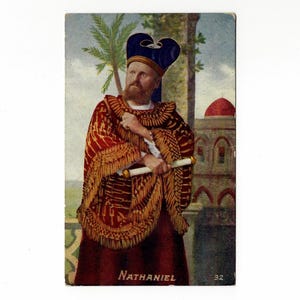 May include: Vintage postcard featuring a man in a red and gold robe and a blue hat, holding a scroll. The word "NATHANIEL" is printed at the bottom. A building with a red dome is in the background.