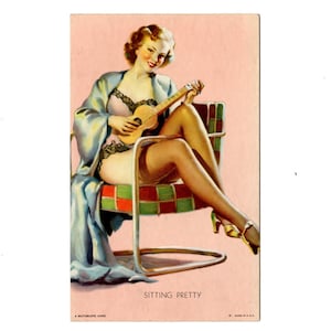 Vintage Gil Elvgren Arcade Card with Pin Up Girl in a Retro Chair Playing Small Guitar, Sitting Pretty Mutoscope Card - 16111j