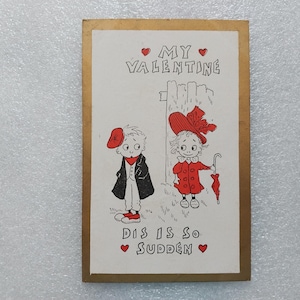 May include: Vintage Valentine's Day card with a gold border. The illustration features two cartoon children, a boy and a girl, with the text "MY VALENTINE" and "DIS IS SO SUDDEN". The boy wears a black coat and red hat. The girl wears a red coat and holds an umbrella.