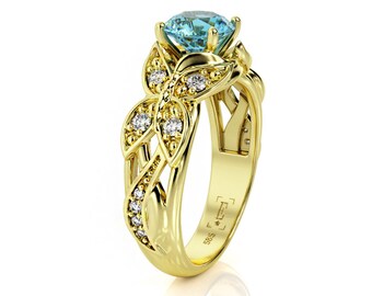 Anello di fidanzamento a farfalla in oro 14 carati: topazio blu e moissanite