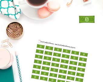 May include: A sheet of 49 green and white sticker labels with the text "pay $ day" on each label. The stickers are designed to look like money bills.