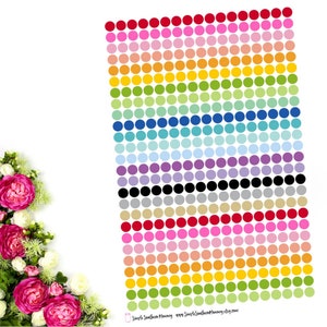 May include: A sheet of colorful dot stickers with a rainbow of colors, including red, orange, yellow, green, blue, purple, pink, and black. The stickers are arranged in rows and columns, and there are 25 dots in each row. The text "Simple Southern Mommy" and "www.SimpleSouthernMommy.etsy.com" is at the bottom of the sheet.