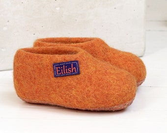 Orange wool toddler slippers with personal name perfect at Montessori school