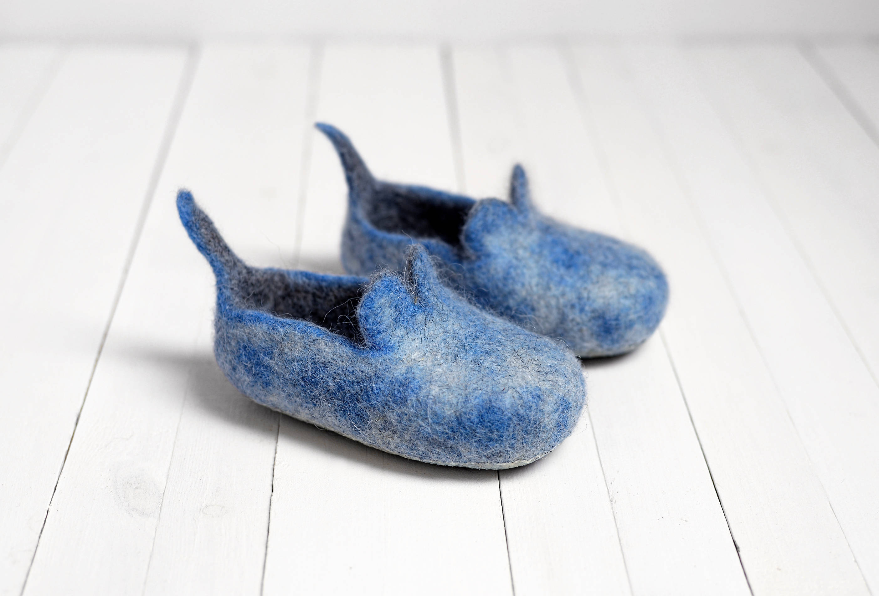 in blue slippers
