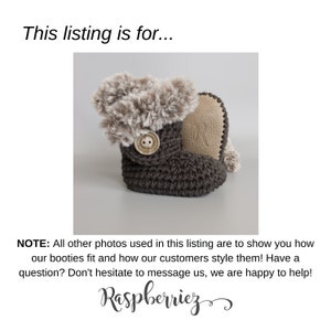 May include: A single crocheted baby bootie in dark gray with a tan faux fur trim and a button closure. The sole is a light tan color. The text "This listing is for..." is at the top of the image, and the text "Raspberriez" is at the bottom.