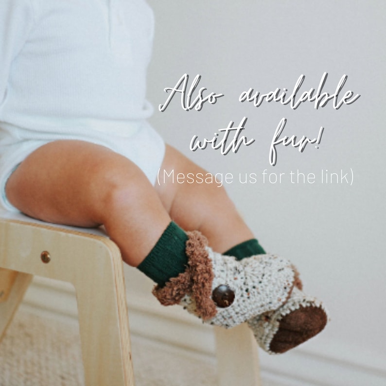 May include: A baby wearing a white onesie and green and brown knitted booties. The booties have a brown fur trim. The text "Also available with fur! (Message us for the link)" is written on a white background.