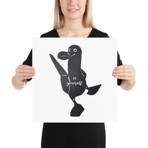 May include: Black and white illustration of a bird with the text "BE YOURSELF" on its chest.