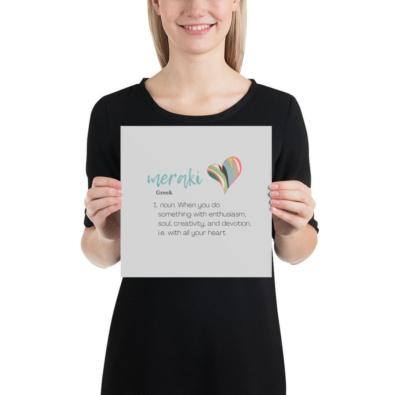 May include: A printable poster with a gray background and a teal heart with colorful stripes. The poster defines the word "meraki" as a Greek word meaning "to do something with enthusiasm, soul, creativity, and devotion, i.e. with all your heart."
