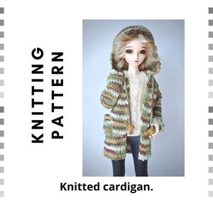 May include: Knitting pattern for a hooded cardigan with stripes in green, brown, and white. The cardigan has large wooden buttons and pockets. The pattern is for a doll.