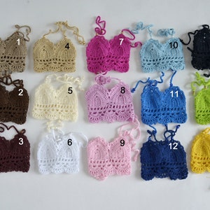 May include: A collection of fifteen handmade crochet halter tops in various colors, including brown, beige, pink, blue, and black. Each top features a unique design and is displayed on a white background. The tops are numbered 1 through 15.