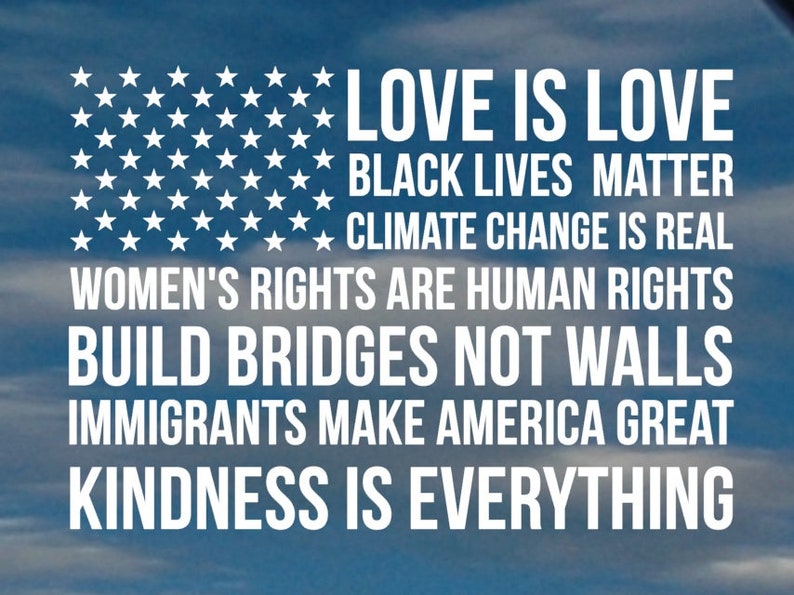 May include: A blue background with white text that reads "LOVE IS LOVE", "BLACK LIVES MATTER", "CLIMATE CHANGE IS REAL", "WOMEN'S RIGHTS ARE HUMAN RIGHTS", "BUILD BRIDGES NOT WALLS", "IMMIGRANTS MAKE AMERICA GREAT", and "KINDNESS IS EVERYTHING".