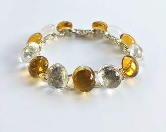 Made to order, amber yellow and clear glass nugget link bracelet  on silver plated link bracelet finding with sturdy clasp.