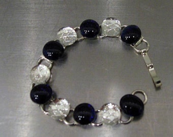 Made to order, purple grape and clear glass nugget link bracelet on silver plated link bracelet finding with sturdy clasp.