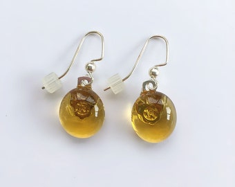 Made to order, light yellow glass nugget dangling dot drop earrings on surgical steel ear wire with rubber ear nuts.