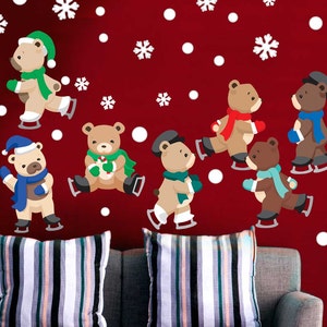 May include: A gray couch with two striped pillows in front of a red wall with white snowflakes and eight cartoon bears wearing winter hats and ice skates.