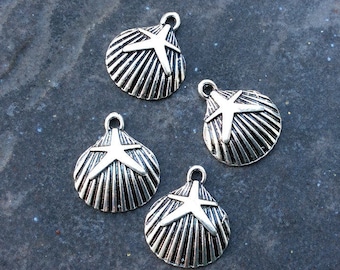 Sea Shell Charms with Starfish accents silver finish Package of 4 charms perfect for Beach theme jewelry