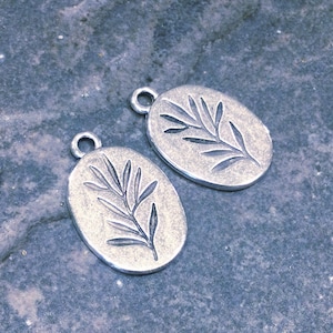 Artisan style  oval Flower charms package of 2 antique silver finish charms Lead free