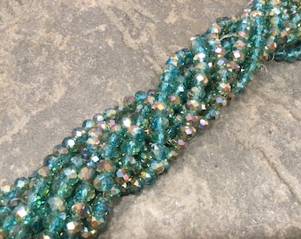 Medium Turquoise with metallic Rainbow finish 6mm faceted crystal rondelle beads full 16”