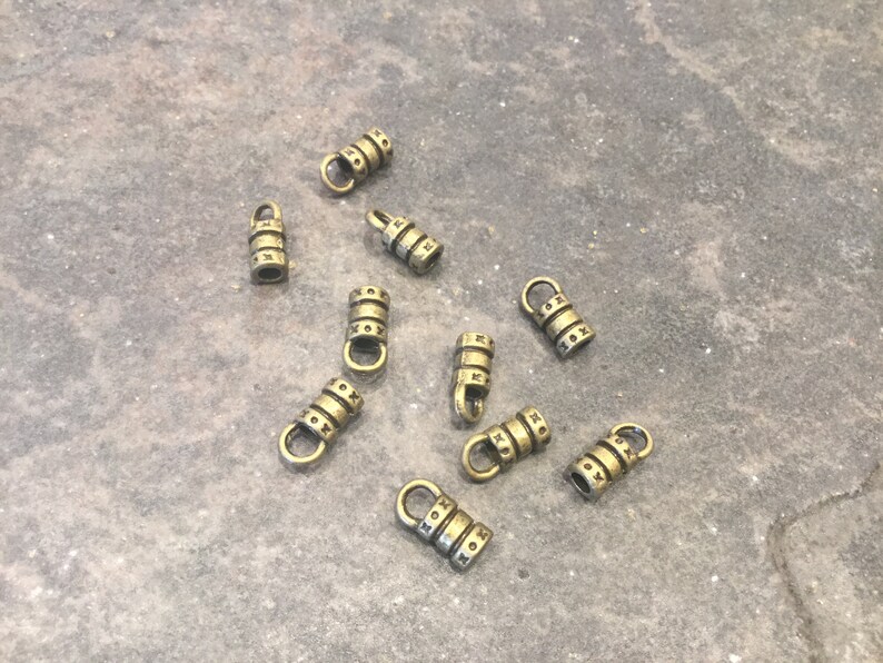 Leather cord ends in antique bronze finish Fits up to 2mm cord Etsy