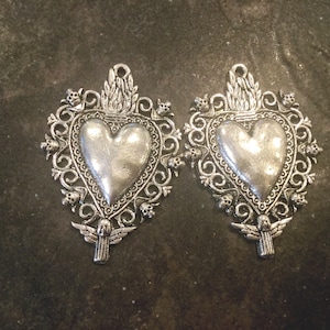 Large Rustic Heart pendants with skull detail  perfect for jewelry making Package of 2