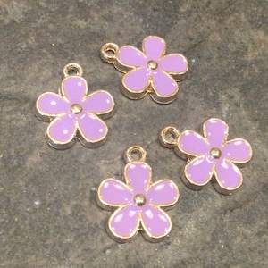 Daisy flower charms in gold finish with purple enamel detail package of 4 charms great for Easter and Spring Jewelry projects